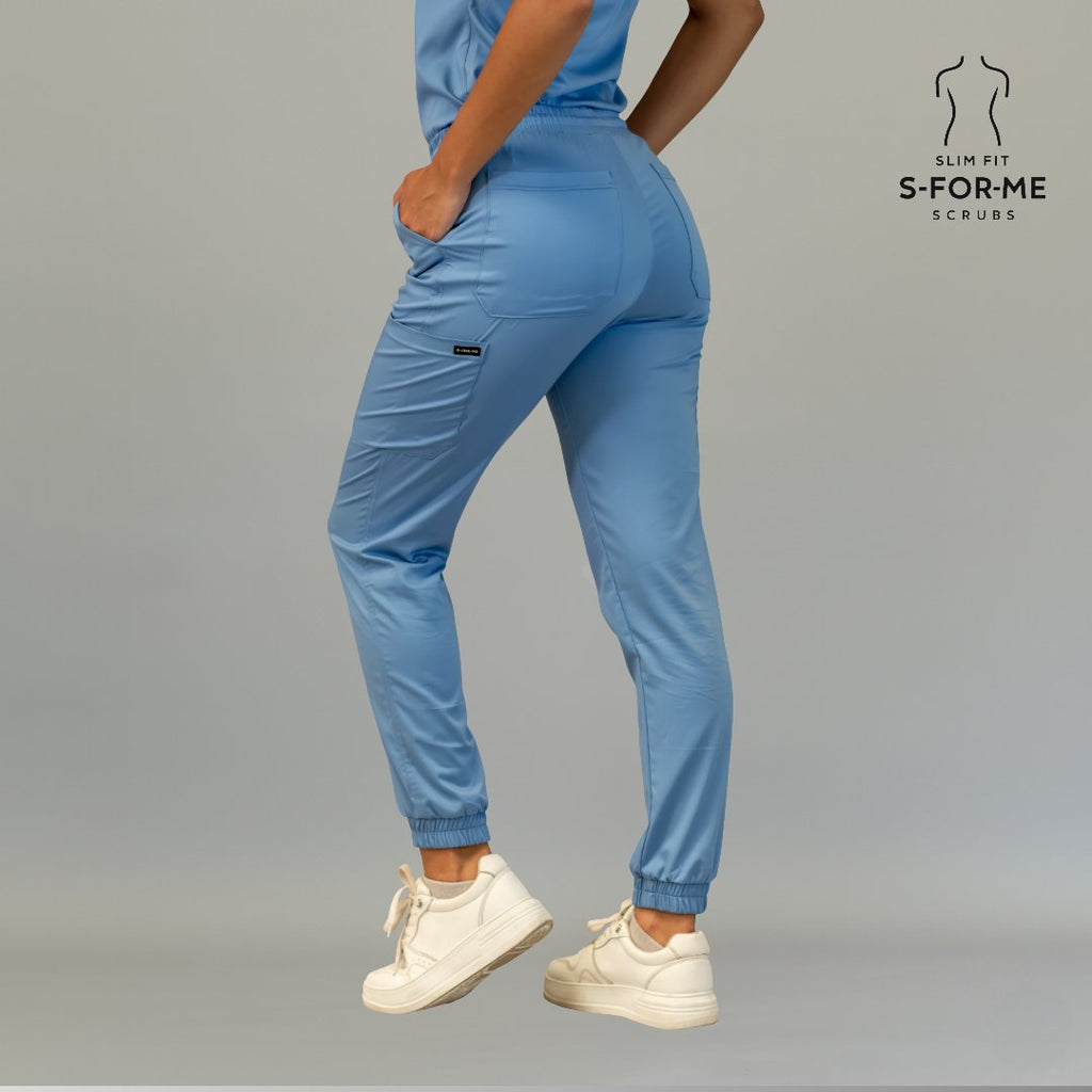 Back side view of women’s ceil blue scrub joggers with rear pockets and slim fit